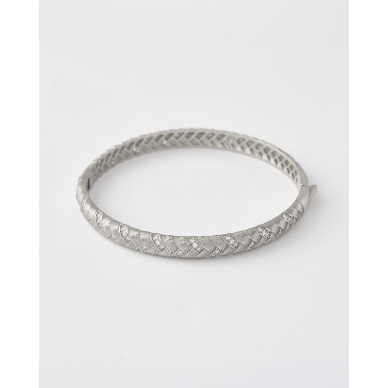 PULSERA TRENZADADA EN ESPIGA Y...